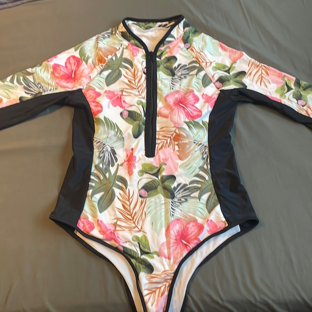 One piece rash guard swimsuit.